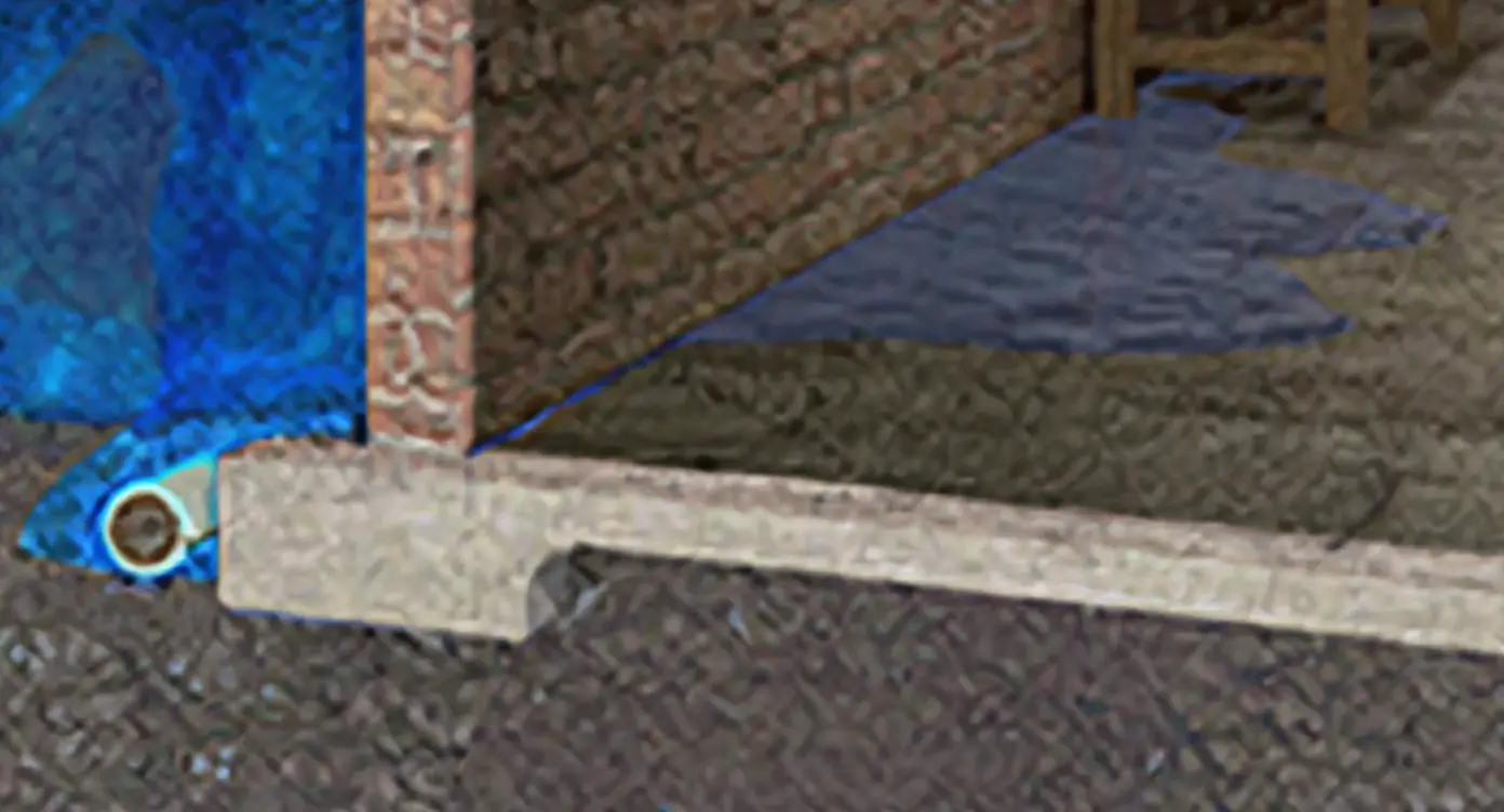 White efflorescence mineral deposits forming along the cove joint at the wall-floor junction confirming chronic moisture migration through the basement foundation